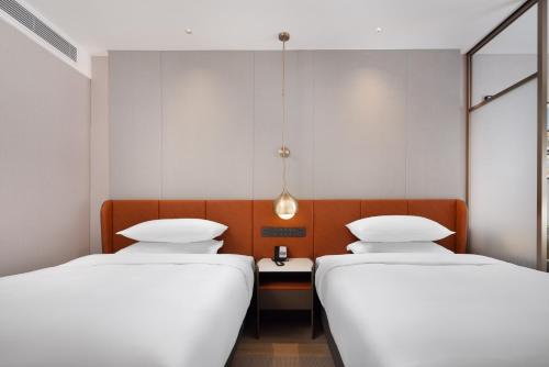 Imagen de la habitación del Hotel Home2 Suite by Hilton Hengyang Xidu. Foto 19