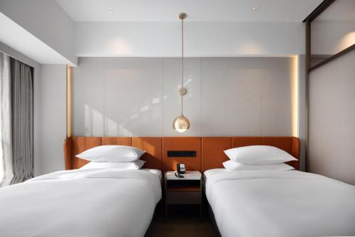 Imagen general del Hotel Home2 Suite by Hilton Jinan Tangye. Foto 6