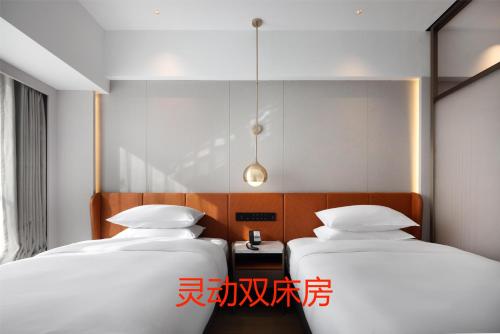 Imagen general del Hotel Home2 Suite by Hilton Jinan Tangye. Foto 10