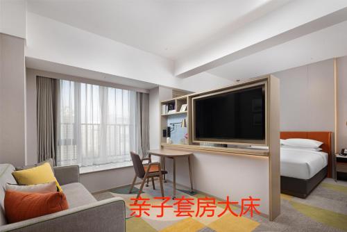 Imagen de la habitación del Hotel Home2 Suite by Hilton Jinan Tangye. Foto 19