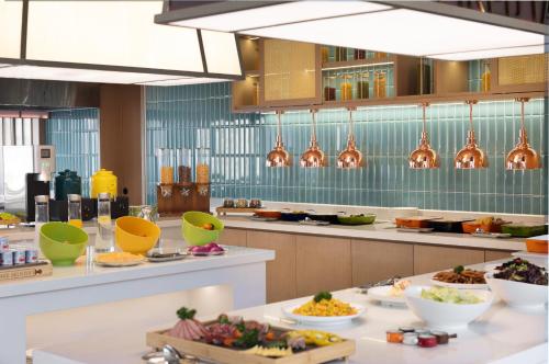 Imagen general del Hotel Home2 Suite by Hilton Jingjiang Binjiang New Town. Foto 2