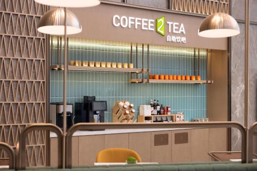 Imagen general del Hotel Home2 Suite by Hilton Jingjiang Binjiang New Town. Foto 3