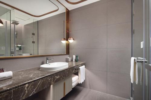 Imagen de la habitación del Hotel Home2 Suite by Hilton Quanzhou Anxi. Foto 7