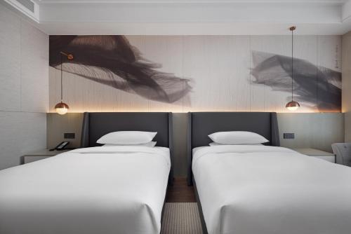 Imagen de la habitación del Hotel Home2 Suite by Hilton Quanzhou Anxi. Foto 8