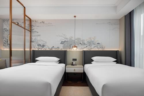 Imagen de la habitación del Hotel Home2 Suite by Hilton Quanzhou Anxi. Foto 12