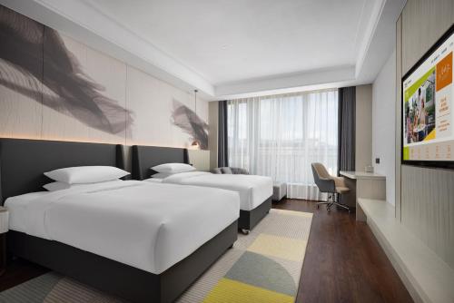 Imagen de la habitación del Hotel Home2 Suite by Hilton Quanzhou Anxi. Foto 14