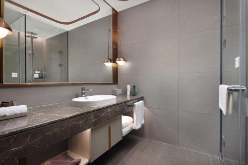 Imagen de la habitación del Hotel Home2 Suite by Hilton Quanzhou Anxi. Foto 15