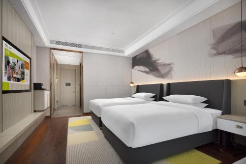 Imagen de la habitación del Hotel Home2 Suite by Hilton Quanzhou Anxi. Foto 16