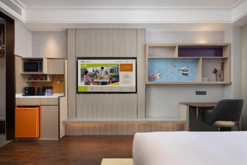 Imagen de la habitación del Hotel Home2 Suite by Hilton Quanzhou Anxi. Foto 18