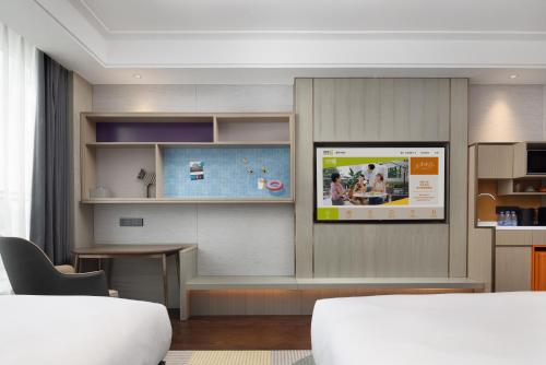 Imagen de la habitación del Hotel Home2 Suite by Hilton Quanzhou Anxi. Foto 19