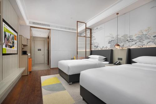 Imagen de la habitación del Hotel Home2 Suite by Hilton Quanzhou Anxi. Foto 20