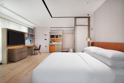 Imagen general del Hotel Home2 Suite by Hilton Rizhao Wanpingkou. Foto 8