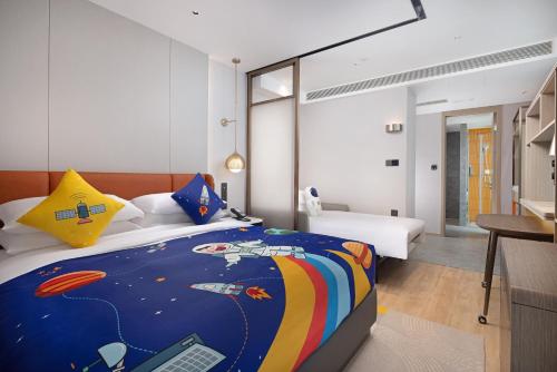 Imagen de la habitación del Hotel Home2 Suite by Hilton Rizhao Wanpingkou. Foto 17