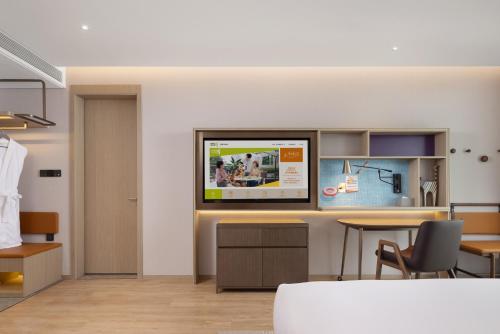 Imagen de la habitación del Hotel Home2 Suite by Hilton Rizhao Wanpingkou. Foto 18