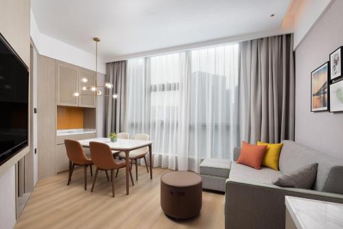 Imagen de la habitación del Hotel Home2 Suite by Hilton Wuhan Economic Development Zone. Foto 20