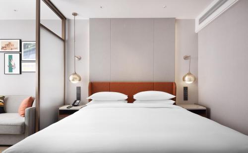 Imagen de la habitación del Hotel Home2 Suite by Hilton Xinjiang Kashgar. Foto 13