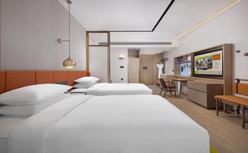 Imagen de la habitación del Hotel Home2 Suite by Hilton Xinjiang Kashgar. Foto 15