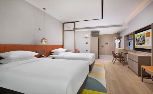 Imagen de la habitación del Hotel Home2 Suite by Hilton Xinjiang Kashgar. Foto 18