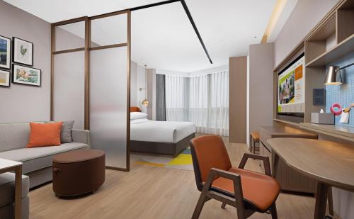 Imagen de la habitación del Hotel Home2 Suite by Hilton Xinjiang Kashgar. Foto 19