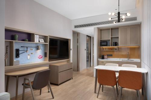 Imagen de la habitación del Hotel Home2 Suite by Hilton Yantai Laishan. Foto 3