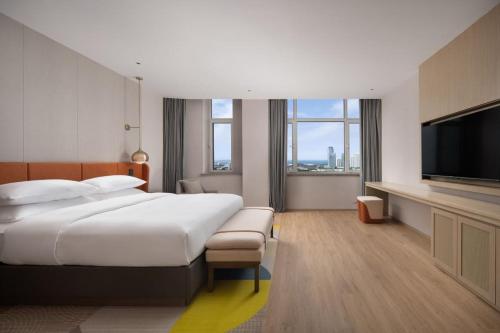 Imagen de la habitación del Hotel Home2 Suite by Hilton Yantai Laishan. Foto 6