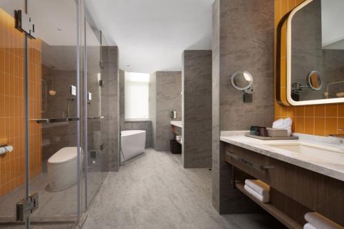 Imagen de la habitación del Hotel Home2 Suite by Hilton Yantai Laishan. Foto 7