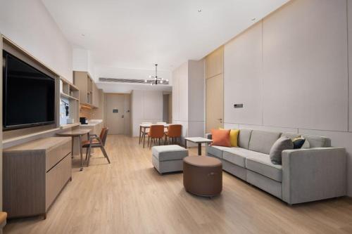 Imagen de la habitación del Hotel Home2 Suite by Hilton Yantai Laishan. Foto 9