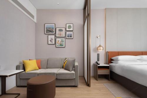 Imagen de la habitación del Hotel Home2 Suite by Hilton Yantai Laishan. Foto 13