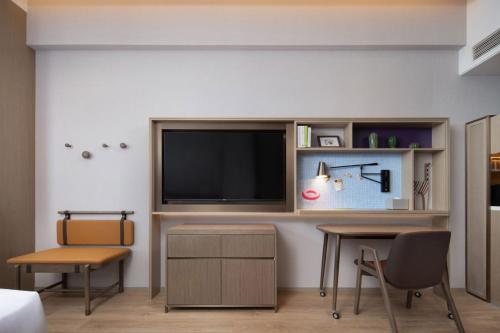 Imagen de la habitación del Hotel Home2 Suite by Hilton Yantai Laishan. Foto 14
