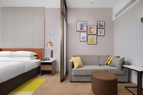 Imagen de la habitación del Hotel Home2 Suite by Hilton Yantai Laishan. Foto 18
