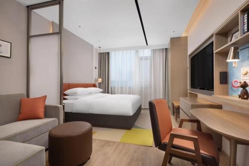 Imagen general del Hotel Home2 Suite by Meishan Dongpo. Foto 2