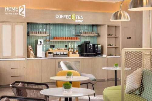 Imagen general del Hotel Home2 Suite by Meishan Dongpo. Foto 3