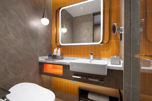 Imagen general del Hotel Home2 Suite by Meishan Dongpo. Foto 8