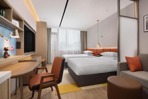Imagen general del Hotel Home2 Suite by Meishan Dongpo. Foto 9