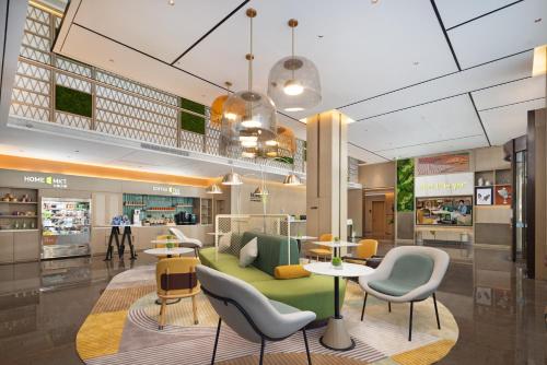 Imagen general del Hotel Home2 Suite by Meishan Dongpo. Foto 14