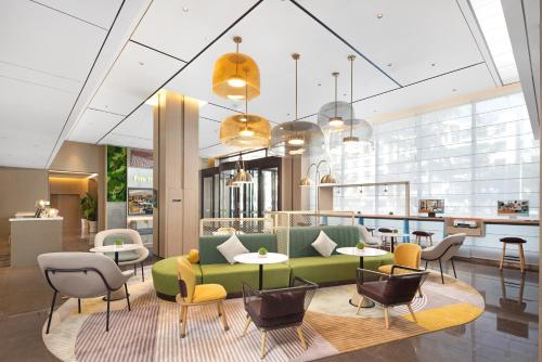 Imagen general del Hotel Home2 Suite by Meishan Dongpo. Foto 15