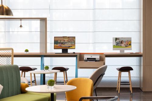 Imagen general del Hotel Home2 Suite by Meishan Dongpo. Foto 16