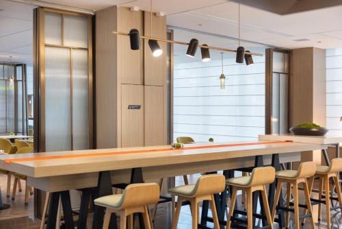 Imagen general del Hotel Home2 Suite by Meishan Dongpo. Foto 18