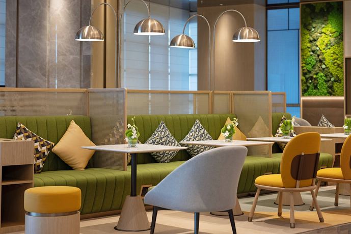 Imagen de los interiores del Hotel Home2 Suites By Hilton Guiyang Airport. Foto 17