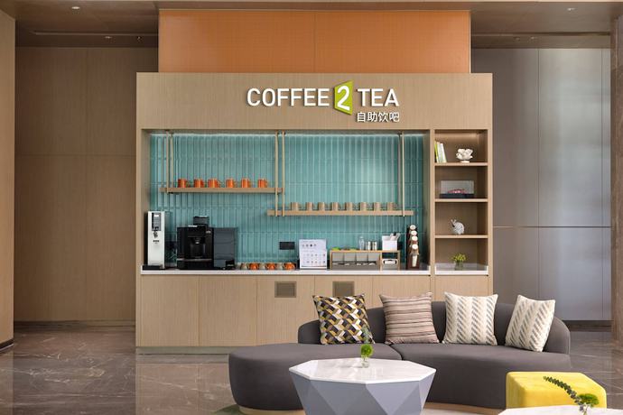 Imagen de los interiores del Hotel Home2 Suites By Hilton Guiyang Airport. Foto 18