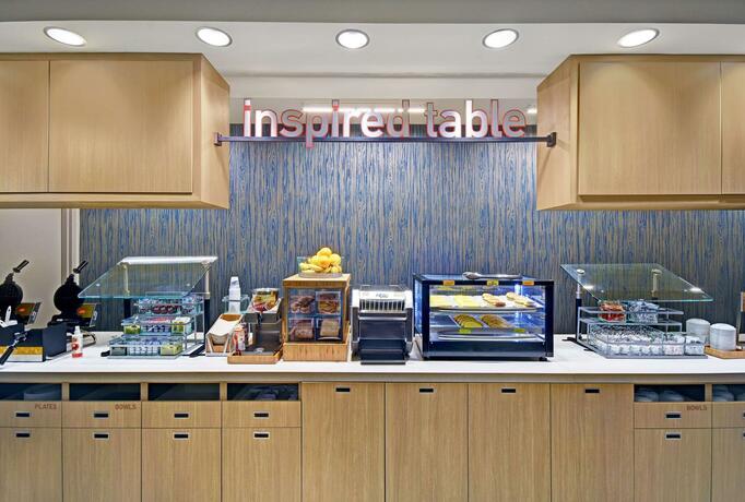 Imagen del bar/restaurante del Hotel Home2 Suites By Hilton Raleigh North I-540. Foto 22