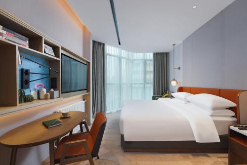 Imagen de la habitación del Hotel Home2 Suites By Hilton Wuhan Hankou Railway Station. Foto 14