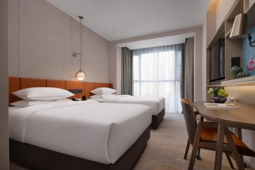 Imagen de la habitación del Hotel Home2 Suites By Hilton Wuhan Hankou Railway Station. Foto 17