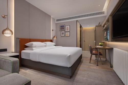 Imagen de la habitación del Hotel Home2 Suites By Hilton Wuhan Hankou Railway Station. Foto 18