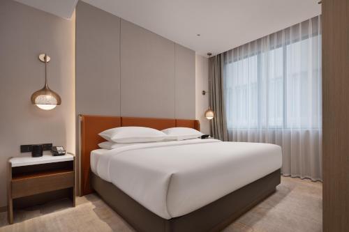 Imagen de la habitación del Hotel Home2 Suites By Hilton Wuhan Hankou Railway Station. Foto 19