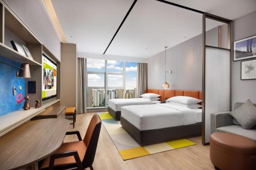 Imagen de la habitación del Hotel Home2 Suites By Hilton Wuhan Xudong. Foto 14