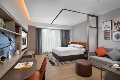 Imagen de la habitación del Hotel Home2 Suites By Hilton Wuhan Xudong. Foto 15