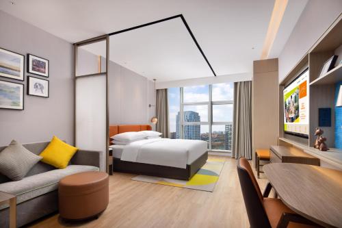 Imagen de la habitación del Hotel Home2 Suites By Hilton Wuhan Xudong. Foto 18