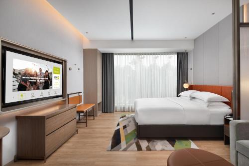 Imagen de la habitación del Hotel Home2 Suites By Hilton Wuhan Xudong. Foto 19