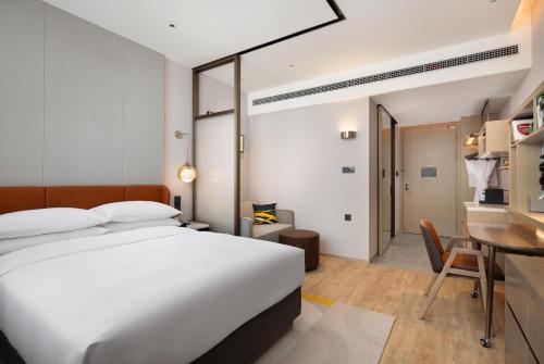Imagen de la habitación del Hotel Home2 Suites by Hilton Beijing Shunyi. Foto 17